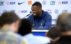 France's forward Marcus Thuram smiles during a press conference at the Jassim-bin-Hamad Stadium in Doha on November 24 , 2022, during the Qatar 2022 World Cup football tournament. (Photo by FRANCK FIFE / AFP)