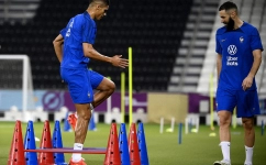 France’s Raphael Varane, left, and Karim Benzema train at the Al Sadd Stadium in Doha on November 17: AFP/Franck Fife