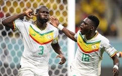 Senegal’s Kalidou Koulibaly, left, and a team-mate celebrate after the former scored their winning goal against Ecuador: AFP/Raul Arboleda