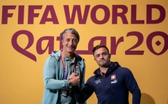 Switzerland's coach Murat Yakin (left) and  Xherdan Shaqiri pose prior to a press conference at the Qatar National Convention Center (QNCC) in Doha on November 27, 2022. (Photo by FABRICE COFFRINI / AFP)