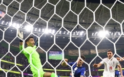 Christian Pulisic of the US scores the only goal of the FIFA World Cup Group B match past Iran's Alireza Beiranvand at the Al Thumama Stadium, Doha, Qatar, on  November 29, 2022. REUTERS/Kai Pfaffenbach