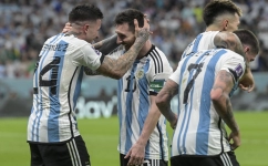 Argentina’s Enzo Fernandez celebrates with Lionel Messi after scoring their second goal against Mexico: AFP/Juan Mabromata
