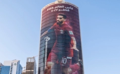 The poster of Qatar national team captain Hassan Al Haydos adorns the QOC building in Doha.