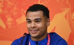 Netherland's forward Cody Gakpo attends a press conference at the Qatar University training site, in Doha, on November 27, 2022. (Photo by Alberto PIZZOLI / AFP)