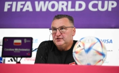 Poland's coach Czeslaw Michniewicz gives a press conference at the Qatar National Convention Center (QNCC) in Doha, on November 21, 2022. (Photo by ANDREJ ISAKOVIC / AFP)