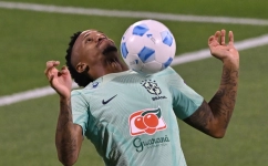 Brazil's defender Eder Militao controls the ball during a training session at the Al Arabi SC Stadium in Doha on November 20, 2022, just moments before the kick-off of the Qatar 2022 World Cup football tournament. (Photo by NELSON ALMEIDA / AFP)