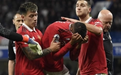 France international and Manchester United defender Raphael Varane in tears after sustaining injury during the Premier League Match against Chelsea at the Stamford Bridge in London on October 22, 2022.