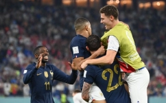 France's Kylian Mbappe (centre) celebrates with teammates after scoring his team's second goal during the Qatar 2022 World Cup Group D match against Denmark at Stadium 974 in Doha on November 26, 2022. (Photo by FRANCK FIFE / AFP)