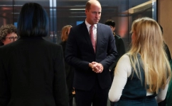 Britain's Prince William (C) meets with members of the Welsh Youth Parliament during a visit to the Senedd, the Welsh Parliament, in Cardiff on November 16, 2022. (Photo by Geoff Caddick / POOL / AFP)