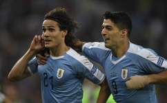 Edinson Cavani, left, and Luiz Suarez: AFP