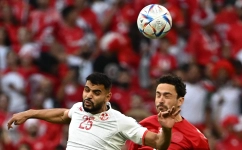 Denmark’s Thomas Delaney, right, and Tunisia’s Anis Ben Slimane vie for the ball: AFP/Anne-Christine Poujoulat