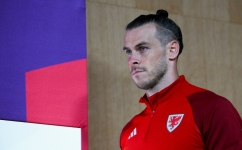 Wales' forward Gareth Bale arrives for a press conference at the Qatar National Convention Center (QNCC) in Doha on November 28, 2022. (Photo by Nicolas TUCAT / AFP)