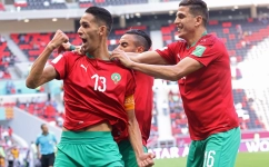 Morocco's Badr Benoun, left, celebrates with team-mates after scoring against Jordam at the 2021 FIFA Arab Cup in Doha. AFP: Karim Sahib