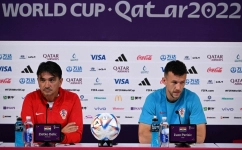 Croatia's coach Zlatko Dalic (left) and midfielder Ivan Perisic attend a press conference at the Qatar National Convention Center (QNCC) in Doha on November 26, 2022. (Photo by OZAN KOSE / AFP)
