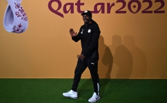 Senegal's coach Aliou Cisse arrives to give a press conference at the Qatar National Convention Center (QNCC) in Doha on November 28, 2022. (Photo by OZAN KOSE / AFP)