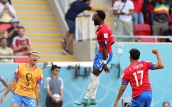Costa Rica's defender Keysher Fuller (centre) celebrates after scroing the only goal of the match against Japan at the Ahmad Bin Ali Stadium in Al-Rayyan, west of Doha on November 27, 2022. (Photo by Giuseppe CACACE / AFP)