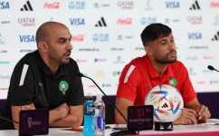 Morocco's coach Hoalid Regragui (left) and midfielder Yahya Jabrane attend a press conference at the Qatar National Convention Center (QNCC) in Doha on November 26, 2022. (Photo by Fadel Senna / AFP)