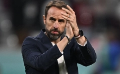 England's coach Gareth Southgate applauds at the end of the Qatar 2022 World Cup Group B football match between England and Iran at the Khalifa International Stadium in Doha on November 21, 2022. (Photo by Paul ELLIS / AFP)