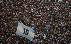 n this aerial view fans of Argentina celebrate winning the Qatar 2022 World Cup against France at the Obelisk in Buenos Aires, on December 18, 2022. (Photo by Luis ROBAYO / AFP)