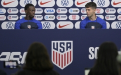 USA's forward Christian Pulisic (right) and USA's forward Timothy Weah give a press conference at Al Gharafa SC Stadium in Doha on December 1, 2022. (Photo by JUAN MABROMATA / AFP)