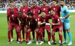 Qatar team: AFP/Karim Jaafar