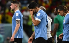 Uruguay's forward Luis Suarez reacts crying at the end of the Qatar 2022 World Cup Group H match against Ghana at the Al-Janoub Stadium in Al-Wakrah on December 2, 2022. (Photo by Pablo PORCIUNCULA / AFP)
