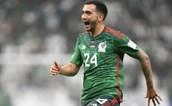Mexico's Luis Chavez celebrates scoring his team's second goal during the Qatar 2022 World Cup Group C match against Saudi Arabia at the Lusail Stadium in Lusail on November 30, 2022. (Photo by Alfredo ESTRELLA / AFP)