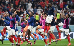 France players celebrate their semifinal victory over Morocco: AFP/Franck Fife