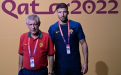 Portugal's coach Fernando Santos (left) and Ruben Dias arrive for a press conference at the Qatar National Convention Center (QNCC) in Doha on December 5, 2022. (Photo by PATRICIA DE MELO MOREIRA / AFP)