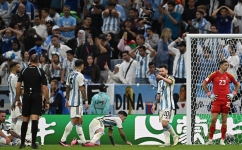 Argentina captain Lionel Messi, second right, and team-mates react after the Netherlands’ Wout Weghorst scored their second goal during their quarterfinal: AFP/Manan Vatsyayana