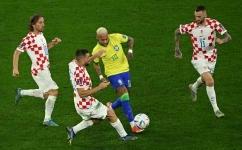 Brazil’s Neymar being challenged by Croatia’s Luka Modric, left, and Mateo Kovacic: AFP/Ina Fassbender