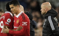 Manchester United’s Dutch manager Erik ten Hag watches as Cristiano Ronaldo is subbed on for Anthony Martial, left: AFP/Oli Scarff