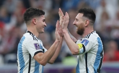 Argentina’s Julian Alvarez, left, and Lionel Messi in a joyous mood against Croatia: AFP/Giuseppe Cacace