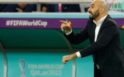 Morocco's coach Walid Regragui gestures during the Qatar 2022 World Cup quarter-final match against Portugal at the Al-Thumama Stadium in Doha on December 10, 2022. (Photo by Odd ANDERSEN / AFP)