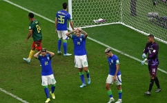 Brazil players react after Cameroon scored against them: AFP/Anne-Christine Poujoulat