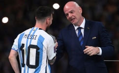 FIFA President Gianni Infantino greets Argentina’s star Lionel Messi: AFP/Franck Fife