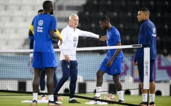 France coach Didier Deschamps puts his players through their paces at the Al Sadd SC training centre ahead of the final against Argentina: AFP/Franck Fife