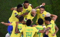 Brazil players celebrate after Neymar, centre, scored against South Korea: AFP/Kirill Kudryavtsev