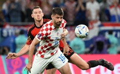 Belgium’s Jan Vertonghen, left, fights for the ball with Croatia’s Bruno Petkovic: AFP/Chandan Khanna