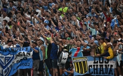 Argentina supporters celebrate after their team won the Qatar 2022 World Cup football semi-final match between Argentina and Croatia at Lusail Stadium in Lusail, north of Doha on December 13, 2022. (Photo by Anne-Christine POUJOULAT / AFP)