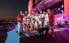 The victorious Poland team members with Qatar Legacy Ambassadors Cafu and Ronald de Boer: SC