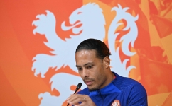 Netherlands' defender Virgil van Dijk gives a press conference at the Qatar University Training Site 6 in Doha on December 7, 2022. (Photo by Alberto PIZZOLI / AFP)