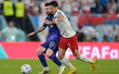 Argentina’s Lionel Messi, left, and Poland’s Robert Lewandowski fight for the ball: AFP/Juan Mabromata