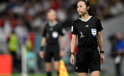 Japanese fourth official Yoshimi Yamashita looks on during the match between Wales and England on November 29: AFP/Nicolas Tucat
