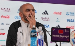 Morocco's coach Hoalid Regragui attends a press conference at the Qatar National Convention Center (QNCC) in Doha on December 5, 2022. (Photo by KARIM JAAFAR / AFP)