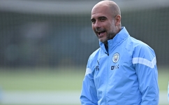 In this file photo taken on September 5, 2022 Manchester City's manager Pep Guardiola leads a training session at the Manchester City training ground in Manchester.  (Photo by OLI SCARFF / AFP)