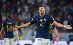France’s Kylian Mbappe celebrates scoring against Poland: AFP/Franck Fife