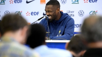 France's forward Marcus Thuram smiles during a press conference at the Jassim-bin-Hamad Stadium in Doha on November 24 , 2022, during the Qatar 2022 World Cup football tournament. (Photo by FRANCK FIFE / AFP)
