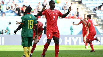 Switzerland’s Breel Embolo celebrates after scoring the winner against Cameroon: AFP/Fabrice Coffrini