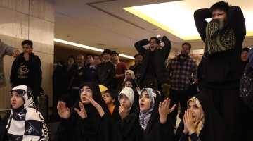 Iranian fans react while watching their World Cup match against the United States in Tehran: AFP/Atta Kenare